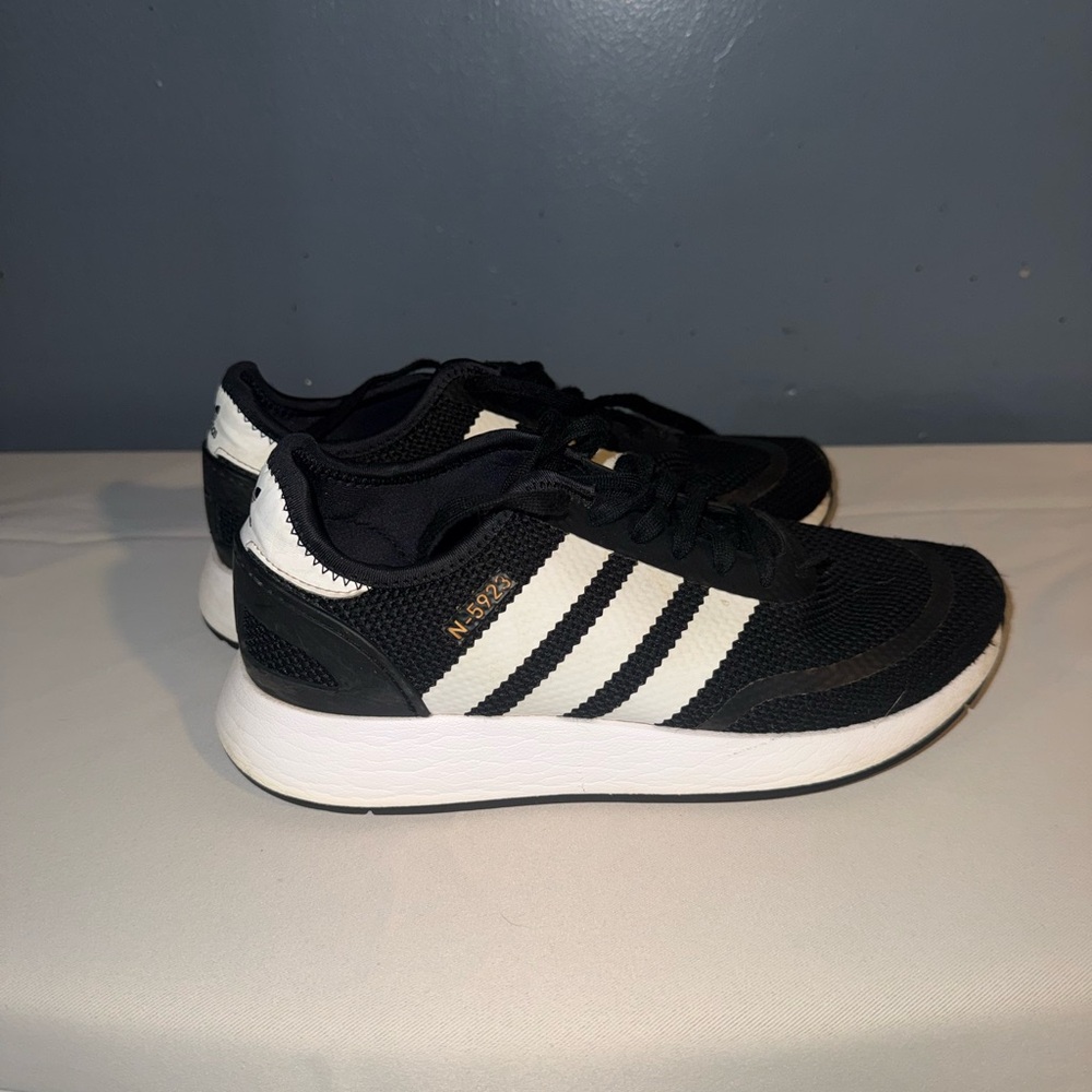 Adidas Black and White Sneakers with Gold Detail